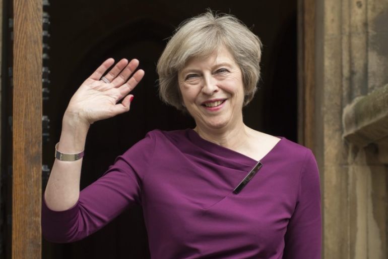 British Home Secretary Theresa May waves to members of the media outside of The Houses of Parliament in London, Britain, 07 July 2016. Theresa May and Andrea Leadsom will battle for the leadership of Conservative party after Michael Gove was eliminated in the second ballot on 07 July 2016.