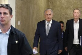 Israeli Prime Minister Benjamin Netanyahu (C) arrives to chair the weekly cabinet meeting at his Jerusalem's office, Israel, 03 July 2016.