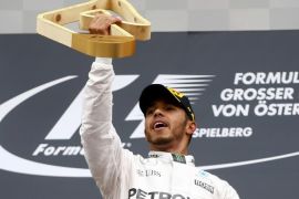 Formula One - Grand Prix of Austria - Spielberg, Austria - 3/7/16 - Mercedes Formula One driver Lewis Hamilton of Britain celebtares victory after the race. REUTERS/Dominic Ebenbichler