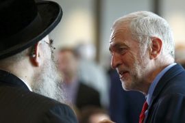 The leader of Britain's opposition Labour party, Jeremy Corbyn (R), speaks with Rabbi Pinter during an event into antisemitism within the Labour party, in London, Britain June 30, 2016. REUTERS/Peter Nicholls