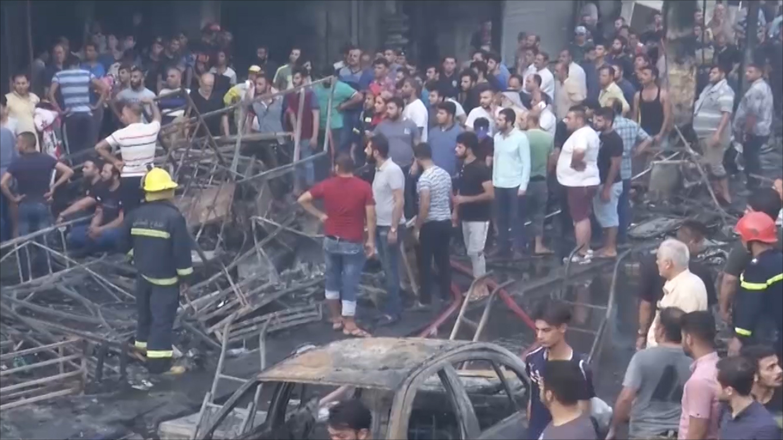 تفجير سيارة مفخخة في حي الكرادة بالعاصمة العراقية بغداد (الجزيرة)