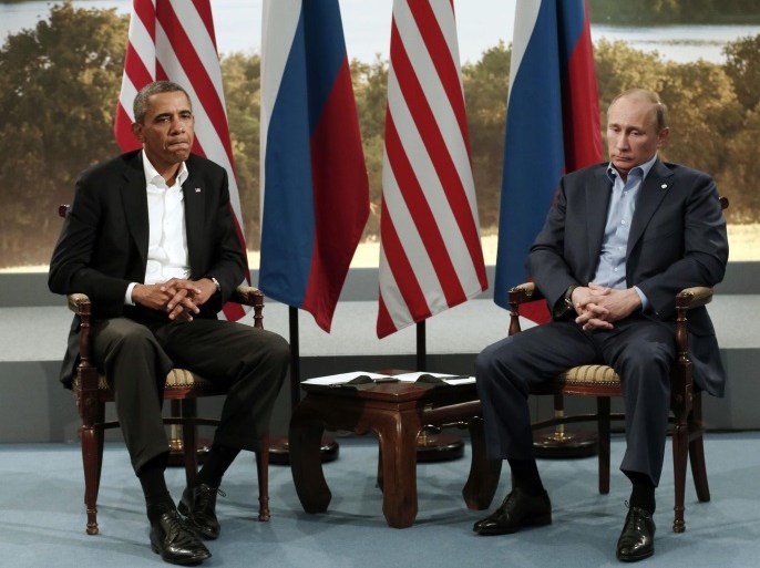 U.S. President Barack Obama (L) meets with Russian President Vladimir Putin during the G8 Summit at Lough Erne in Enniskillen, Northern Ireland, in this June 17, 2013 file picture. At Obama's most recent meeting with Putin during a G8 summit in Northern Ireland in June, the Russian president scowled, lectured and fidgeted. At times he glowered. Would a better relationship with Putin have made Obama take a different decision on attending the September talks in Moscow? P