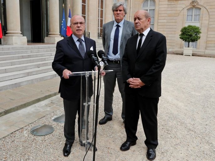 French Defence minister Jean-Yves Le Drian, French Interior Minister Bernard Cazeneuve and French Agriculture Minister and Government spokesperson Stephane Le Foll (R) talk to the media at the Elysee Palace after a weekly cabinet meeting in Paris, France, July 27, 2016. REUTERS/Benoit Tessier