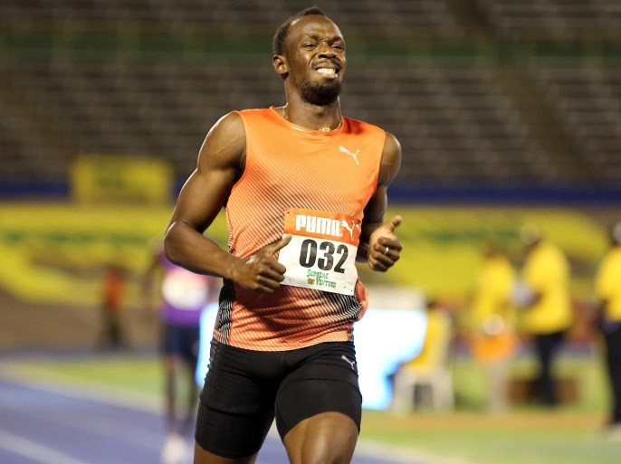Athletics - Jamaica National Trials - Kingston - 30/06/16 Winner Usain Bolt of Jamaica upset after his quarter final 100m race. REUTERS/Gilbert Bellamy
