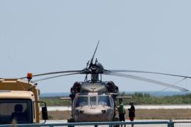 A Turkish military helicopter Black Hawk is seen at Dimokritos Airport of Alexandoupolis, northern Greece, 16 July 2016. The eight Turkish military officers that were on board the helicopter that landed in the early hours at Alexandroupolis airport sought political asylum in Greece. The Greek General Staff in an announcement on the landing of the Turkish Black Hawk helicopter on Saturday at 11:51 at Alexandroupolis airport said 'we inform you that the Black Hawk helicopter immediate return to Turkey is being planned while the responsible authorities for asylum will examine the helicopter passengers' request for political asylum in Greece'. Turkish Prime Minister Yildirim reportedly said that the Turkish military was involved in an attempted coup d'etat. According to news reports, Turkish President Recep Tayyip Erdogan has denounced the coup attempt as an 'act of treason' and insisted his government remains in charge.