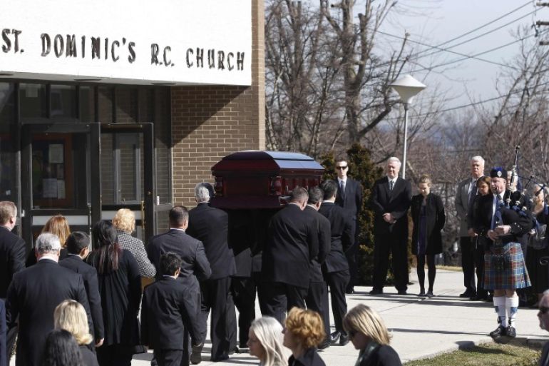 The casket of journalist Marie Colvin is carried into her funeral service at St. Dominic's Church in Oyster Bay, New York, March 12, 2012. Colvin's final dispatch, published just three days before she and a French photographer were killed by shell and rocket fire, came from a bleak cellar packed with women and children cowering in the besieged Syrian city of Homs.