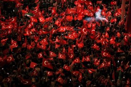 Supporters of Turkish President Tayyip Erdogan wave Turkish national flags during a pro-government demonstration on Taksim square in Istanbul, Turkey, July 18, 2016. REUTERS/Alkis Konstantinidis