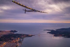"Solar Impulse 2", a solar-powered plane piloted by Bertrand Piccard of Switzerland, flies over the Golden Gate bridge in San Francisco, California, U.S. April 23, 2016, before landing on Moffett Airfield following a 62-hour flight from Hawaii. Jean Revillard/Solar Impulse/Handout via REUTERS/File Photo ATTENTION EDITORS - THIS IMAGE WAS PROVIDED BY A THIRD PARTY. EDITORIAL USE ONLY