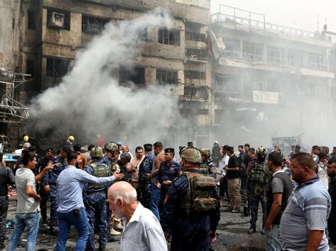 Iraqi policemen inspect the site of a car bomb attack at Baghdad al-Jadida neighborhood, eastern Baghdad, Iraq, 09 June 2016. Media reports state that a new wave of bombings northern and eastern Baghdad targeting a crowded market in Baghdad al-Jadida district and a military base in Taji, killed at least 22 people and injured dozens others, in the latest wave of attacks that hit the Iraqi capital.