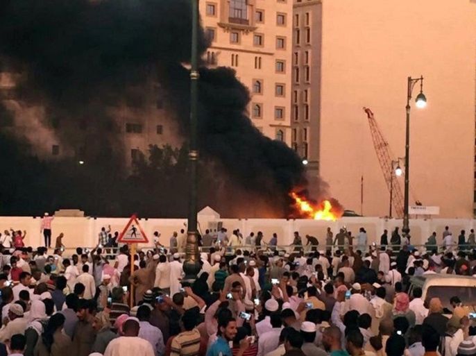 Muslim worshippers gather after a suicide bomber detonated a device near the security headquarters of the Prophet's Mosque in Medina, Saudi Arabia, July 4, 2016. REUTERS/Handout EDITORIAL USE ONLY. NO RESALES. NO ARCHIVE. TPX IMAGES OF THE DAY THIS PICTURE WAS PROCESSED BY REUTERS TO ENHANCE QUALITY. AN UNPROCESSED VERSION HAS BEEN PROVIDED SEPARATELY.