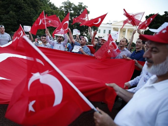 Protesters holding Turkish national flags rally at the Pennsylvania Avenue in opposition to the ongoing attempted coup in Turkey in front of the White House in Washington, DC, USA, 15 July 2016. Turkish Prime Minister Yildirim reportedly said that the Turkish military was involved in an attempted coup d'etat. The Turkish military meanwhile stated it had taken over control.