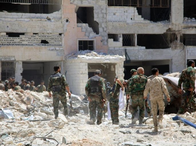 A handout photo released by the official Syrian Arab News Agency (SANA) on 28 July 2016 shows Syrian government soldiers patrolling in al-Layramoun and Bani Zein neighborhoods after recapturing from rebels in the northern province of Aleppo, Syria. According to SANA, Syrian army unites recaptured Bani Zaid neighborhood and began an operation to dismantle the explosives and mines left by opposition forces. EPA/SANA HANDOUT
