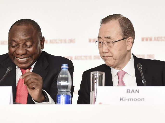 A handout photograph made available by the South African Government Communication and Information System (GCIS) showing South African Deputy President Cyril Ramaphosa (L) with UN General Secretary Ban Ki-moon (R) attending the AIDS 2016 Conference in Durban, South Africa, 18 July 2016. South Africa is hosting the AIDS 2016 Conference scheduled for Durban, from 18-22 July 2016. EPA/Siyasanga Mbambani / GCIS / HAND