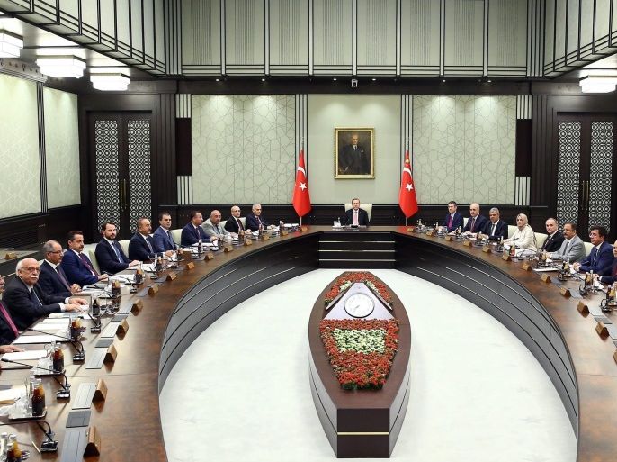 A handout picture provided by Turkish President Press office shows Turkish President Recep Tayyip Erdogan (C), Turkish Prime Minister Binali Yildirim (2-L) attend a cabinet meeting in Ankara, Turkey, 20 July 2016. Turkish Muslim cleric Fethullah Gulen, living in self-imposed exile in the USA, has been accused by Turkish President Recept Tayyip Erdogan of allegedly orchestrating the 15 July failed coup attempt. At least 290 people were killed and almost 1,500 injured am