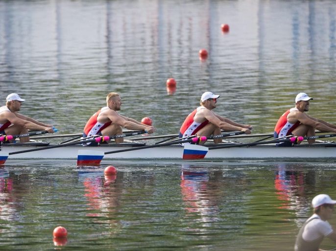 FILE - (from R to L) Sergey Fedorovtsev, Vladislav Ryabcev, Artem Kosov and Nikita Morgachev of Russia in action during the Men's Quadruple Sculls Final race at the Rowing Olympic Qualification on Lake Rotsee in Lucerne, Switzerland, Tuesday, May 24, 2016. The World Rowing Federation says that trimetazidine, a banned substance, was found in a urine sample given by rower Sergei Fedorovtsev in an out-of-competition test on May 17, as world rowing association FISA announced on Friday, 01 July 2016.