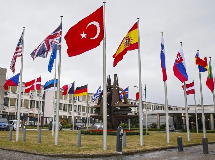 Flags of North Atlantic Treaty Organization (NATO) member countries fly in front of the Nato headquarters in Brussels, Belgium, 28 July 2015. NATO ambassadors were set to discuss recent terrorist attacks in Turkey and Ankara's decision to launch airstrikes in Syria and Iraq. NATO member Turkey requested the meeting under Article 4 of the military alliance's treaty, which allows for consultations if a member state feels its sovereignty is threatened.
