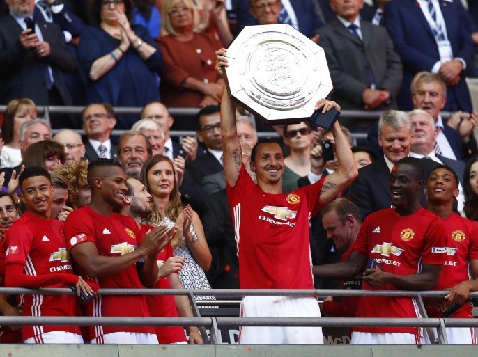 Football Soccer Britain - Leicester City v Manchester United - FA Community Shield - Wembley Stadium - 7/8/16 Manchester United's Zlatan Ibrahimovic celebrates with the trophy after winning the FA Community Shield Reuters / Eddie Keogh Livepic EDITORIAL USE ONLY. No use with unauthorized audio, video, data, fixture lists, club/league logos or "live" services. Online in-match use limited to 45 images, no video emulation. No use in betting, games or single club/league/p
