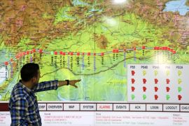 A staff member points at a screen showing a map of the Kirkuk-Ceyhan pipeline at Turkey's Mediterranean port of Ceyhan, which is run by state-owned Petroleum Pipeline Corporation (BOTAS), some 70 km (43.5 miles) from Adana February 19, 2014. Crude oil flow through the Kirkuk-Ceyhan pipeline linking Iraq to Turkey restarted on Wednesday at a rate of at a rate of about 300,000-350,000 barrels per day (bpd), a Turkish energy official said. The pipeline, which carries Kirk