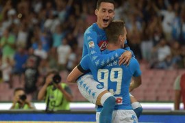 Napoli's Arkadiusz Milik (R) jubilates with his teammate Jose Callejon after scoring the goal during the Italian Serie A soccer match SSC Napoli vs AC Milan at San Paolo stadium in Naples, Italy, 27 August 2016.