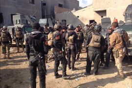قوات أمنية تتجمع في احدى مناطق مدينة الرمادي بعد استعادتها