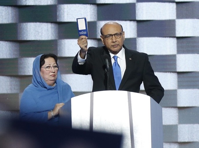 A picture made available on 01 August 2016 shows Khizr Khan (R), father of fallen soldier Human S. M. Khan and his wife Ghazala Kahn (L), holding a copy of the United States Constitution on stage during final day of the Democratic National Convention at the Wells Fargo Center in Philadelphia, Pennsylvania, USA, 28 July 2016. The Khan family where involved in a discussion with Republican Presidential nominee Donald Trump after he made remarks about their speech at the DN