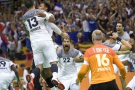 French players celebrate after winning the men's Handball semi final game between Germany and France of the Rio 2016 Olympic Games at the Future Arena in the Olympic Park in Rio de Janeiro, Brazil, 19 August 2016.