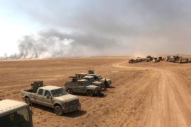 Military vehicles of the Kurdish Peshmerga forces are seen on the southeast of Mosul , Iraq, August 14, 2016. REUTERS/Azad Lashkari