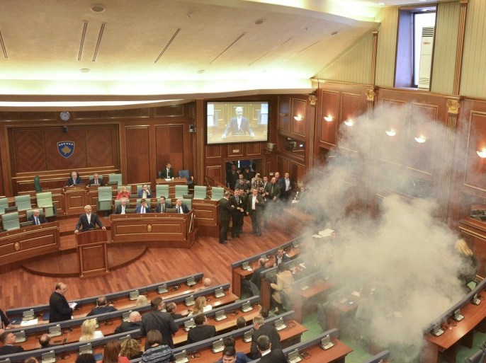 Tear gas is released during a session of parliament in Pristina, Kosovo February 26, 2016. Kosovo parliament is expected to vote the former Prime Minister and guerrilla commander Hashim Thaci as the new country's president despite opposition protests. REUTERS/Agron Beqiri