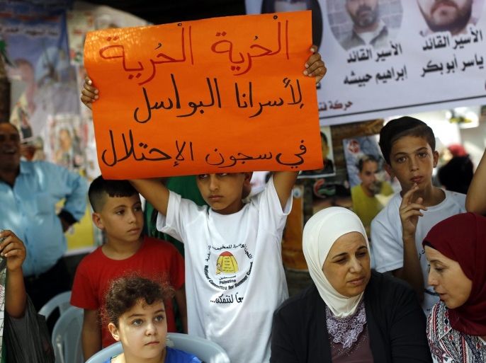 Palestinians sit inside a protest tent demanding the release of Palestinian prisoners who are on hunger strike in Israeli jails, in the West Bank city of Nablus, 03 August 2016. Palestinian prisoners in Israeli jails went on hunger strike in solidarity with Bilal Kayed, a member of Popular front for liberation of Palestine (PFLP) who started his hunger strike on 15 June 2016. after being more than 14 years imprisoned in Israeli jails. Kayed, one of 750 fellow Palestinians held in administrative detention without charge or trial, was put under administrative detention after having served a 14.5-years sentence in prison