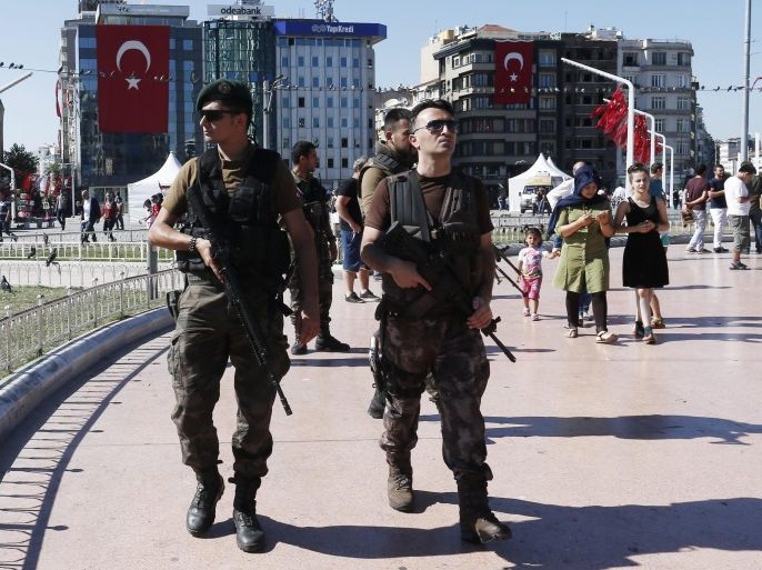 Members of a Turkish SWAT team on duty at Taksim Square, in Istanbul, Turkey, 21 July 2016. Turkish President Recep Tayyip Erdogan has declared a three-month state of emergency and caused the dismissal of 50,000 workers and the arrest of 8,000 people after the 15 July failed coup attempt. At least 290 people were killed and almost 1,500 injured amid violent clashes on 15 July as certain military factions attempted to stage a coup d'etat. The UN and various governments and organizations have urged Turkey to uphold the rule of law and to defend human rights.
