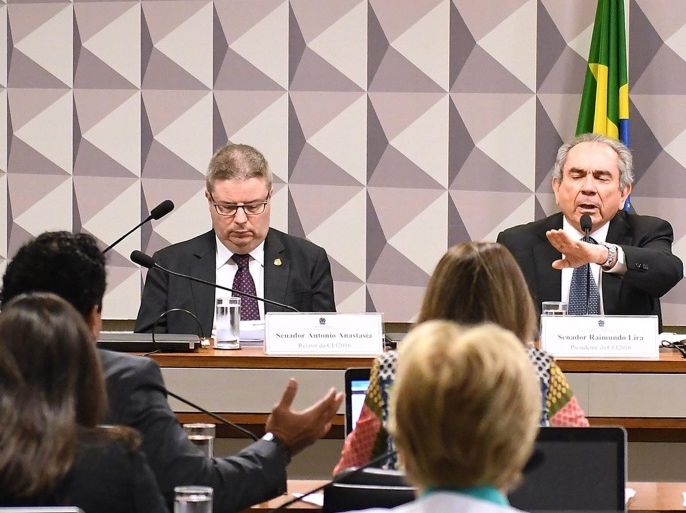 Brazilian Senator Raimundo Lira (R), President of the Brazilian Senate's Impeachment committee against suspended Brazilian President Dilma Rousseff, responds to a question alongside Brazilian Senator Antonio Anastasia (L), rapporteur of the committee, during a session at the Congress in Brasilia, Brazil, 03 August 2016. On 02 August, Anastasia reported there was enough evidence to continue the impeachment of Rousseff, who is accused of irregularities in the management of the State's budget.