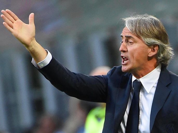 Inter's head coach Roberto Mancini reacts during the Italian Serie A soccer match between Inter Milan and Empoli FC at Giuseppe Meazza stadium in Milan, Italy, 07 May 2016.