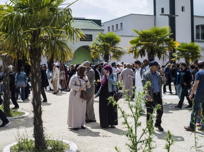 Hundreds of Muslims gather in front of the Great Mosque prior to a walk in tribute to the two victims of the 13 June Magnanville police stabbing attack by Islamic State (IS) assailant Larossi Abballa, in Mantes-La-Jolie, near Paris, France, 19 June 2016. French police officer Jean-Baptiste Salvaing was stabbed outside of his house and his partner Jessica Schneider was killed after being held hostage, on 13 June 2016. Abballa was killed during the police raid.