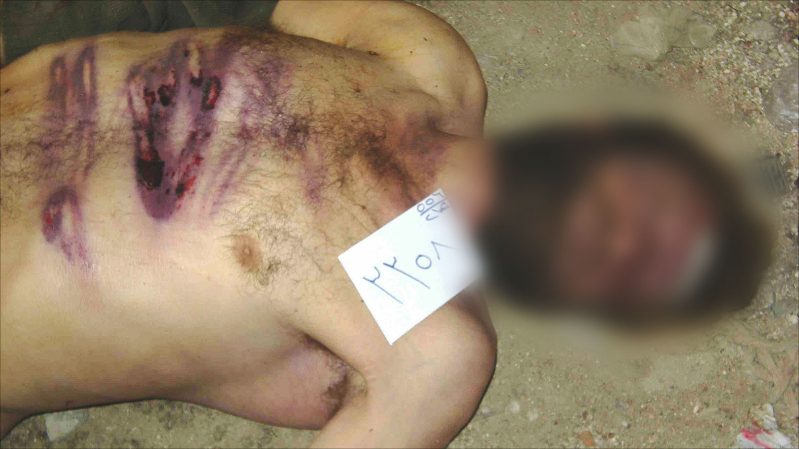 ‪معتقل مات تحت التعذيب في السجون السورية‬ (وكالات)