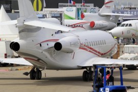 A Dassault Aviation Falcon 7X is taxied to the static exhibition area, three days before the opening of the 50th Paris Air Show, at Le Bourget Airport near Paris June 14, 2013. The Paris Air Show runs from June 17 to 23. REUTERS/Pascal Rossignol (FRANCE - Tags: BUSINESS TRANSPORT)