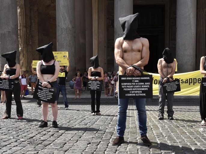 A photo made available by Amnesty International shows members of the human rights organisation taking part in a flash mob in memory of Giulio Regeni and all the victims of torture in Egypt in downtown Rome, Italy, 13 July 2016. Italian student Regeni was likely tortured and killed while in Egyptian state custody, Amnesty International said in a report out 13 July. The group said "the similarities between (Regeni's) injuries and those of Egyptians who died in custody s