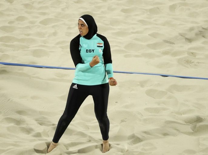 2016 Rio Olympics - Beach Volleyball - Women's Preliminary - Beach Volleyball Arena - Rio de Janeiro, Brazil - 07/08/2016. Doaa Elghobashy (EGY) of Egypt reacts. REUTERS/Lucy Nicholson FOR EDITORIAL USE ONLY. NOT FOR SALE FOR MARKETING OR ADVERTISING CAMPAIGNS.