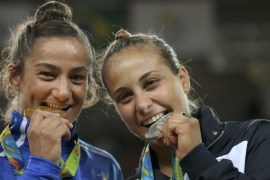 2016 Rio Olympics - Judo - Victory Ceremony - Women -52 kg Victory Ceremony - Carioca Arena 2 - Rio de Janeiro, Brazil - 07/08/2016. Majlinda Kelmendi (KOS) of Kosovo and Odette Giuffrida (ITA) of Italy pose with their medals. REUTERS/Toru Hanai FOR EDITORIAL USE ONLY. NOT FOR SALE FOR MARKETING OR ADVERTISING CAMPAIGNS.