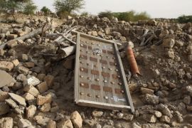 The rubble left from an ancient mausoleum destroyed by Islamist militants, is seen in Timbuktu, Mali, July 25, 2013. A former trainee teacher accused of damaging monuments in the name of Islam in the ancient Malian city of Timbuktu will stand before the International Criminal Court on March 1, 2016 for a hearing to decide if he should face a landmark trial. Picture taken July 25, 2013. REUTERS/Joe Penney