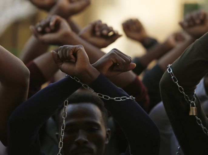 Ethiopian migrants, all members of the Oromo community of Ethiopia living in Malta, protest against the Ethiopian regime in Valletta, Malta, December 21, 2015. Protesters are calling on Malta and the European Union to stop support for the Ethiopian regime, and protested against the regime's plan to evict Oromo farmers to expand Ethiopia's capital Addis Ababa, according to the protest organisers. REUTERS/Darrin Zammit Lupi MALTA OUT. NO COMMERCIAL OR EDITORIAL SALES IN MALTA