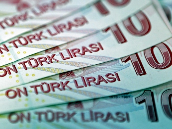 Turkish 10 lira banknotes are seen in this file photo illustration shot in Istanbul, Turkey, January 28, 2014. Turkey's parliamentary election will take place June 7. REUTERS/Murad Sezer/FilesGLOBAL BUSINESS WEEK AHEAD PACKAGE - SEARCH "BUSINESS WEEK AHEAD JUNE 1" FOR ALL IMAGES