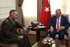 epa05451050 A handout picture provided by Turkish Prime Minister Press office shows, Turkish Prime Minister Binali Yildirim (R) chats with US Chairman of the Joint Chiefs of Staff General Joseph Dunford Jr. (L), during their meeting in Ankara, Turkey, 01 August 2016. The visit of the United States Marine Corps general comes in the aftermath of 15 July failed coup d'etat in Turkey. EPA/TURKISH PRIME MINISTER PRESS OFFICE / HANDOUT HANDOUT EDITORIAL USE ONLY/NO SALES