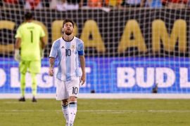 Jun 26, 2016; East Rutherford, NJ, USA; Argentina midfielder Lionel Messi (10) reacts after missing a shot during the shoot out round against Chile in the championship match of the 2016 Copa America Centenario soccer tournament at MetLife Stadium. Chile won. Mandatory Credit: Adam Hunger-USA TODAY Sports