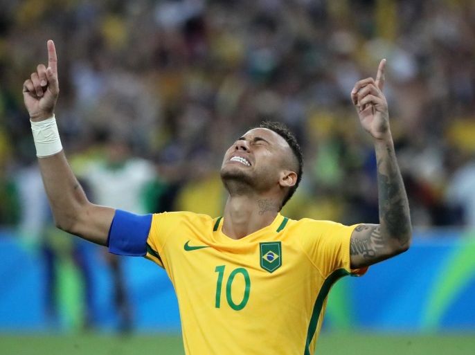 Neymar of Brazil celebrates winning the penalty shoot-out during the men's Gold Medal match between Brazil and Germany of the Rio 2016 Olympic Games Soccer tournament at the Maracana Stadium in Rio de Janeiro, Brazil, 20 August 2016.