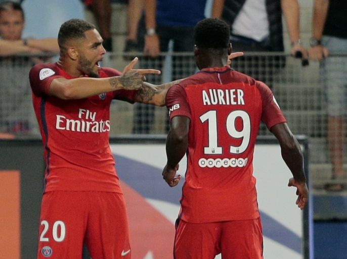 073 - Bastia, Haute-Corse, FRANCE : Saint-Germain's French defender Layvin Kurzawa (L) celebrates with teammate Paris Saint-Germain's Ivorian defender Serge Aurier (R) after scoring a goal during the French Ligue 1 football match between Bastia (SCB) and Paris Saint Germain (PSG) on August 12, 2016 at the Armand Cesari stadium in Bastia on the French Mediterranean island of Corsica. AFP PHOTO / PASCAL POCHARD-CASABIANCA