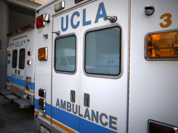 Ambulances are seen outside the UCLA Medical Center in Los Angeles, California March 19, 2015. UCLA, the hospital at the center of the "superbug" outbreak that killed two people and infected seven last month has received poor patient safety scores and had its payments cut by Medicare for high rates of hospital-acquired infections. REUTERS/Lucy Nicholson