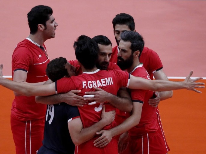 PLayers of Iran react during the men's preliminary round match between Iran and Egypt for the Rio 2016 Olympic Games Volleyball tournament at Maracanazinho indoor arena in Rio de Janeiro, Brazil, 13 August 2016.