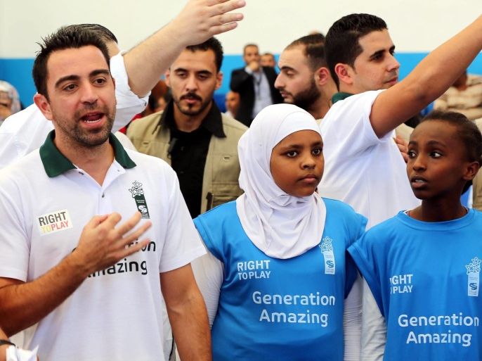 Spanish Football player Xavi Hernandez talks after a friendly game with Palestinian refugees and Syrian refugees at Bakaa Palestinian refugee camp near Amman, Jordan, 29 September 2016. Xavi will begin working with school children, refugees and migrant workers to use the power of football to inspire social change within communities.