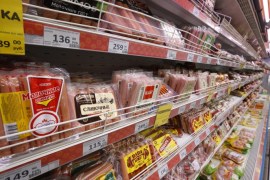 Sausages, chicken and other products are seen on sale in the meat section at a grocery store of the food retailer Dixy in Moscow, Russia December 1, 2015. REUTERS/Sergei Karpukhin