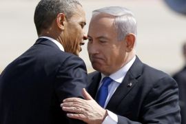 U.S. President Barack Obama hugs Israeli Prime Minister Benjamin Netanyahu at Ben Gurion International Airport Airport in Tel Aviv March 20, 2013. REUTERS/Jason Reed